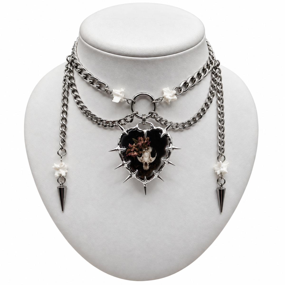 C_4 (Vole skull amulet on a choker with bones and spikes)