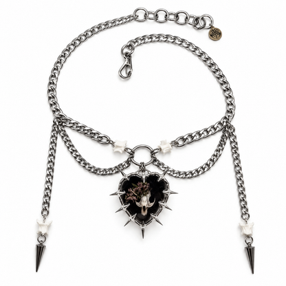 C_4 (Vole skull amulet on a choker with bones and spikes)